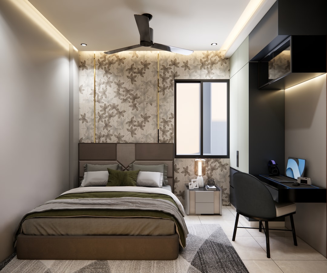 A serene and well-organized small bedroom with light colors and minimal decor, creating an illusion of space and tranquility.